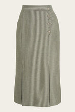 Load image into Gallery viewer, Green and white striped skirt with button details on a beige background