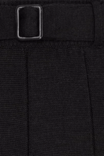 Load image into Gallery viewer, Close-up of a black ribbed knit garment with a matching black belt and a square metal buckle.