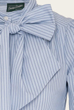 Load image into Gallery viewer, Blue and white striped shirt with a bow collar on a light background