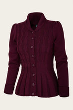 Load image into Gallery viewer, A dark burgundy cable-knit cardigan sweater with a stand-up collar and front button closure, shown against a plain off-white background.