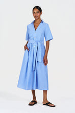 Load image into Gallery viewer, Woman wearing a blue striped dress on a white background