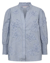 Load image into Gallery viewer, Blue and white striped shirt with floral embroidery on a white background