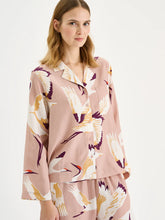 Load image into Gallery viewer, Woman wearing a patterned pajama set on a white background