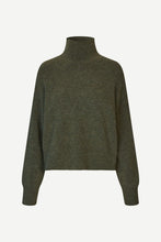 Load image into Gallery viewer, An olive green cropped turtleneck sweater displayed on a clean, light off-white background.