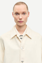 Load image into Gallery viewer, Person wearing a beige coat