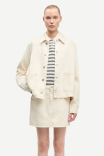 Load image into Gallery viewer, Person wearing a beige coat