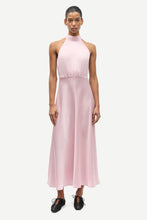 Load image into Gallery viewer, Woman wearing a pink halter neck dress on a white background