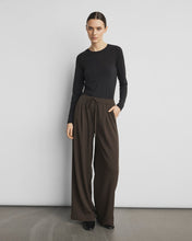 Load image into Gallery viewer, Woman wearing a black top and brown wide-leg pants against a plain background