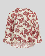 Load image into Gallery viewer, Red floral patterned shirt on a light gray background