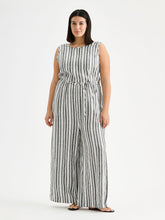 Load image into Gallery viewer, Woman wearing a striped jumpsuit on a white background